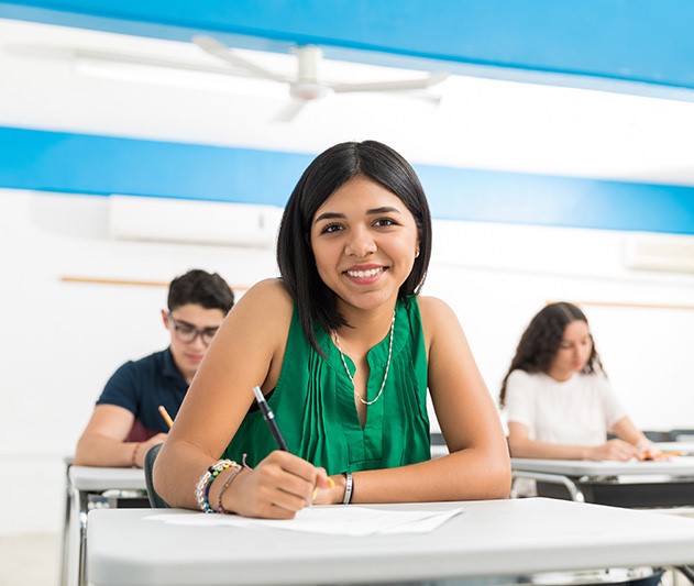 Teen in Class Smiling.